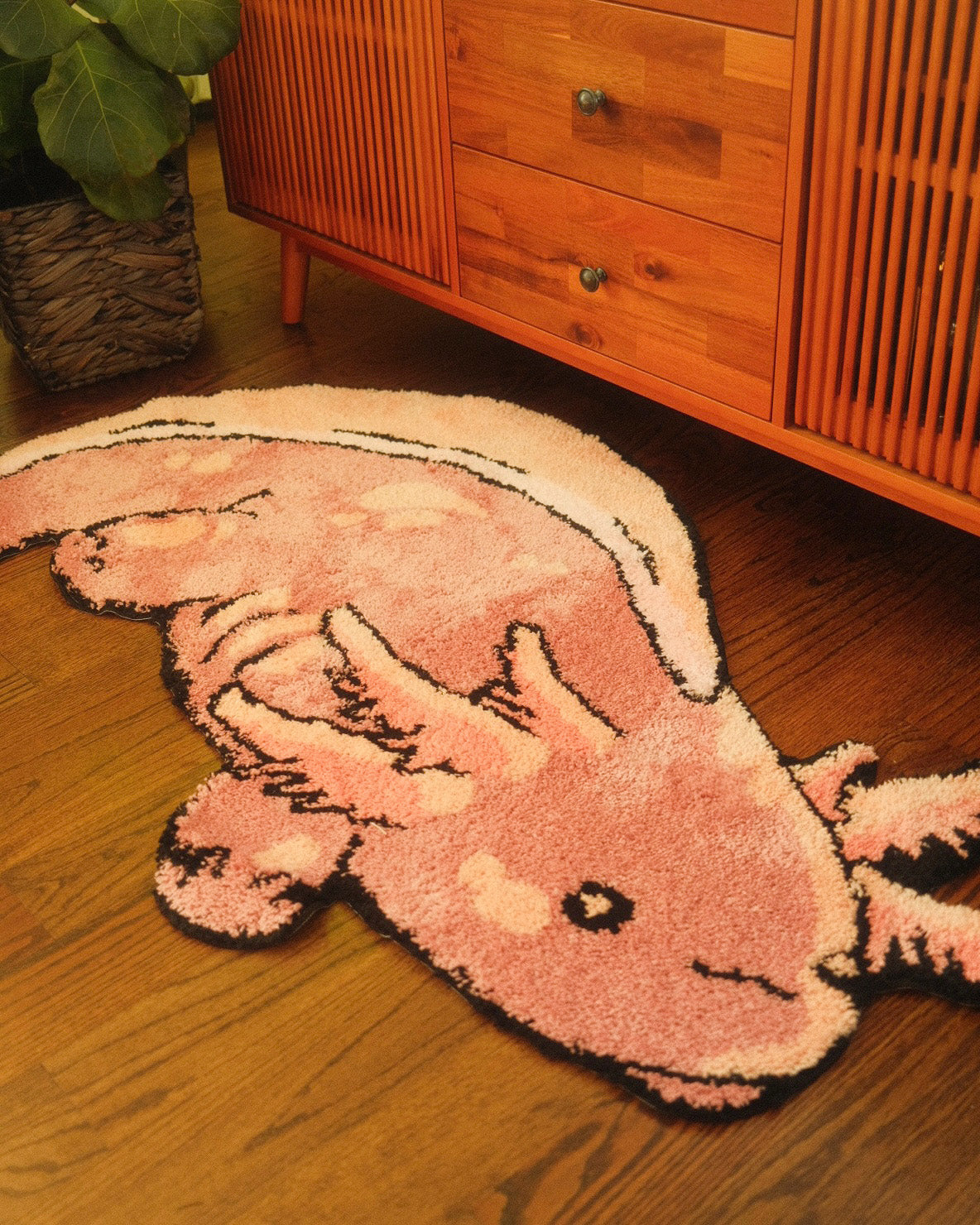 pink axolotl shaped rug