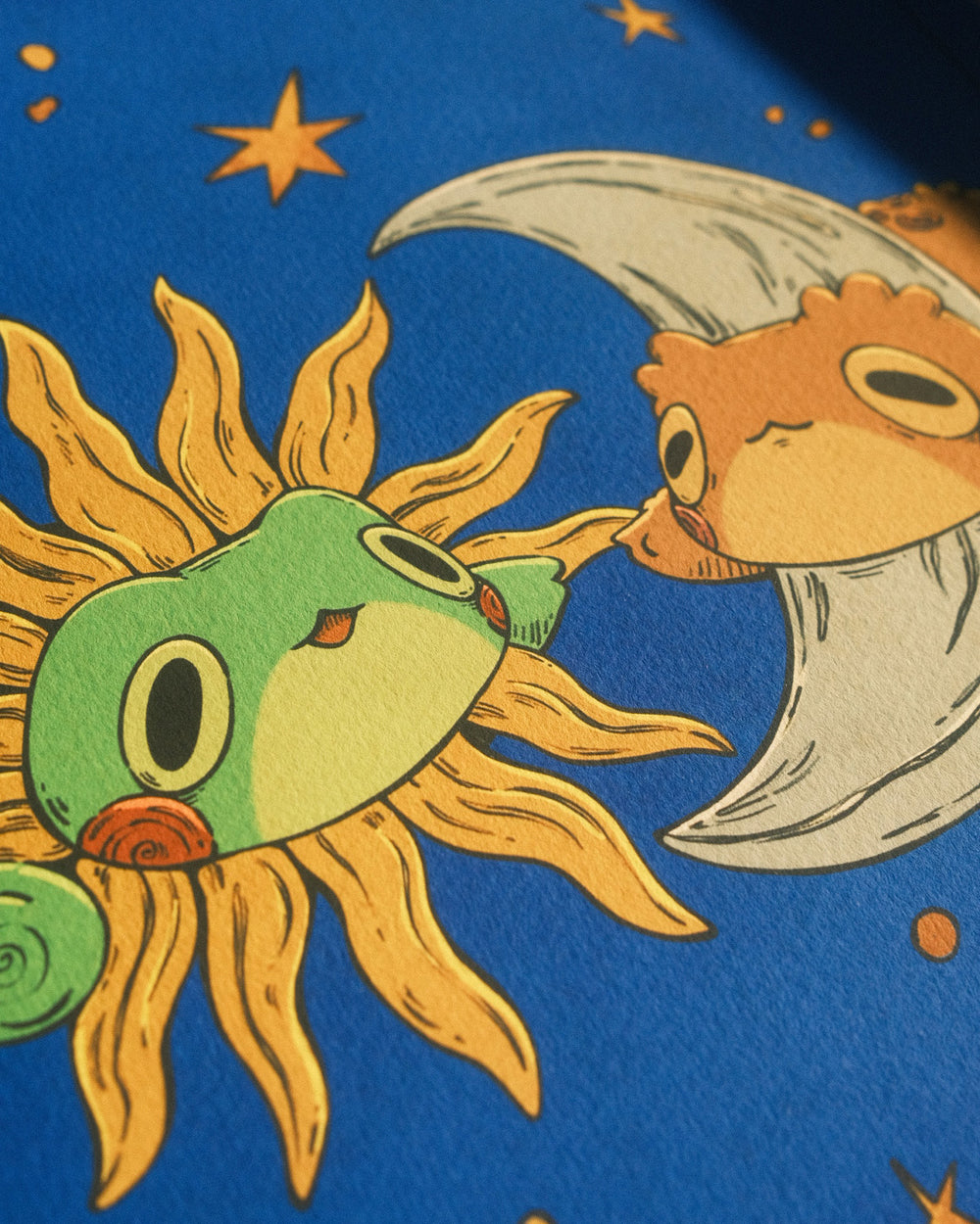 Illustration of a sun and moon frogs with starry background closeup