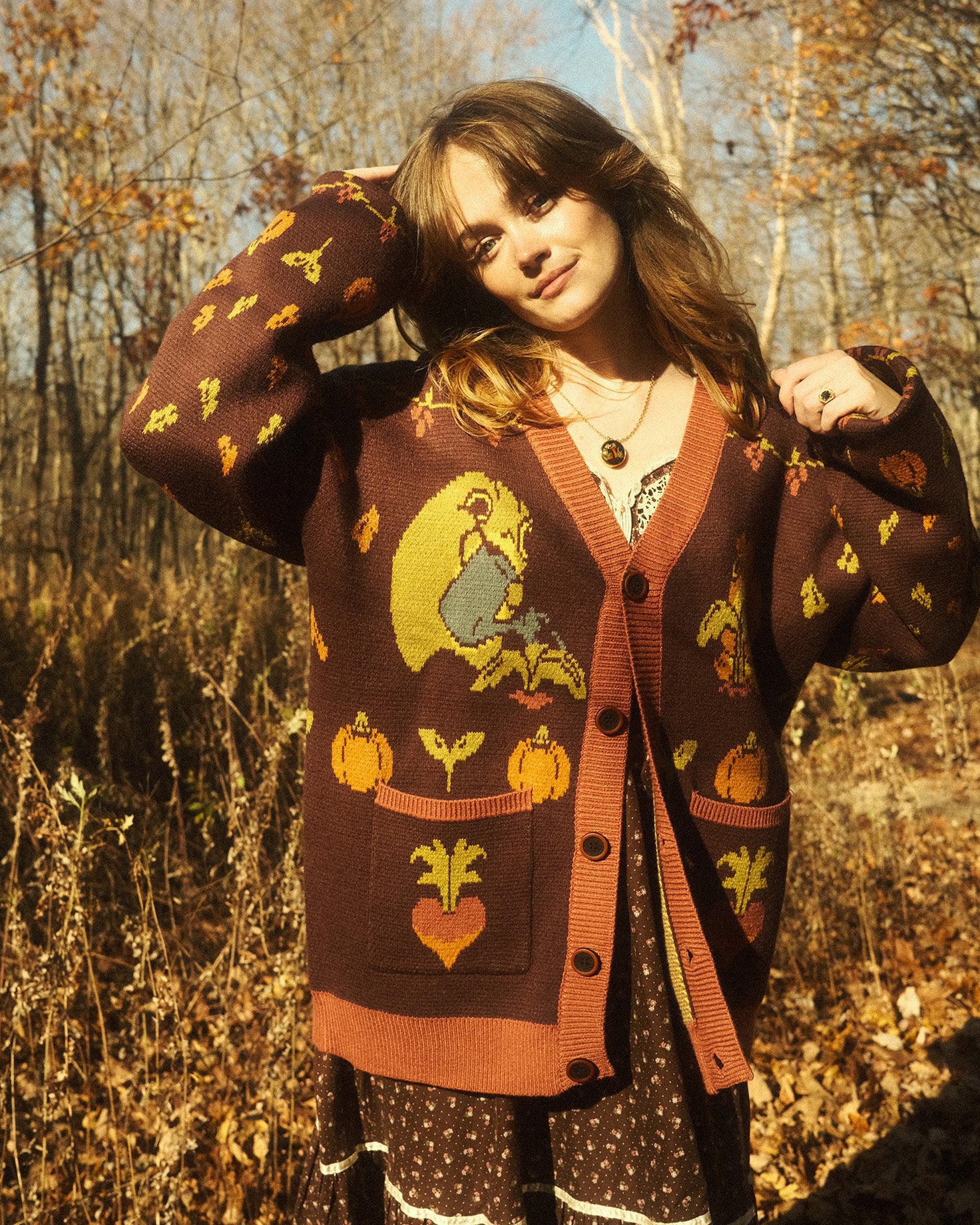abi toads wearing a brown cardigan depicting a frog and toad gardening