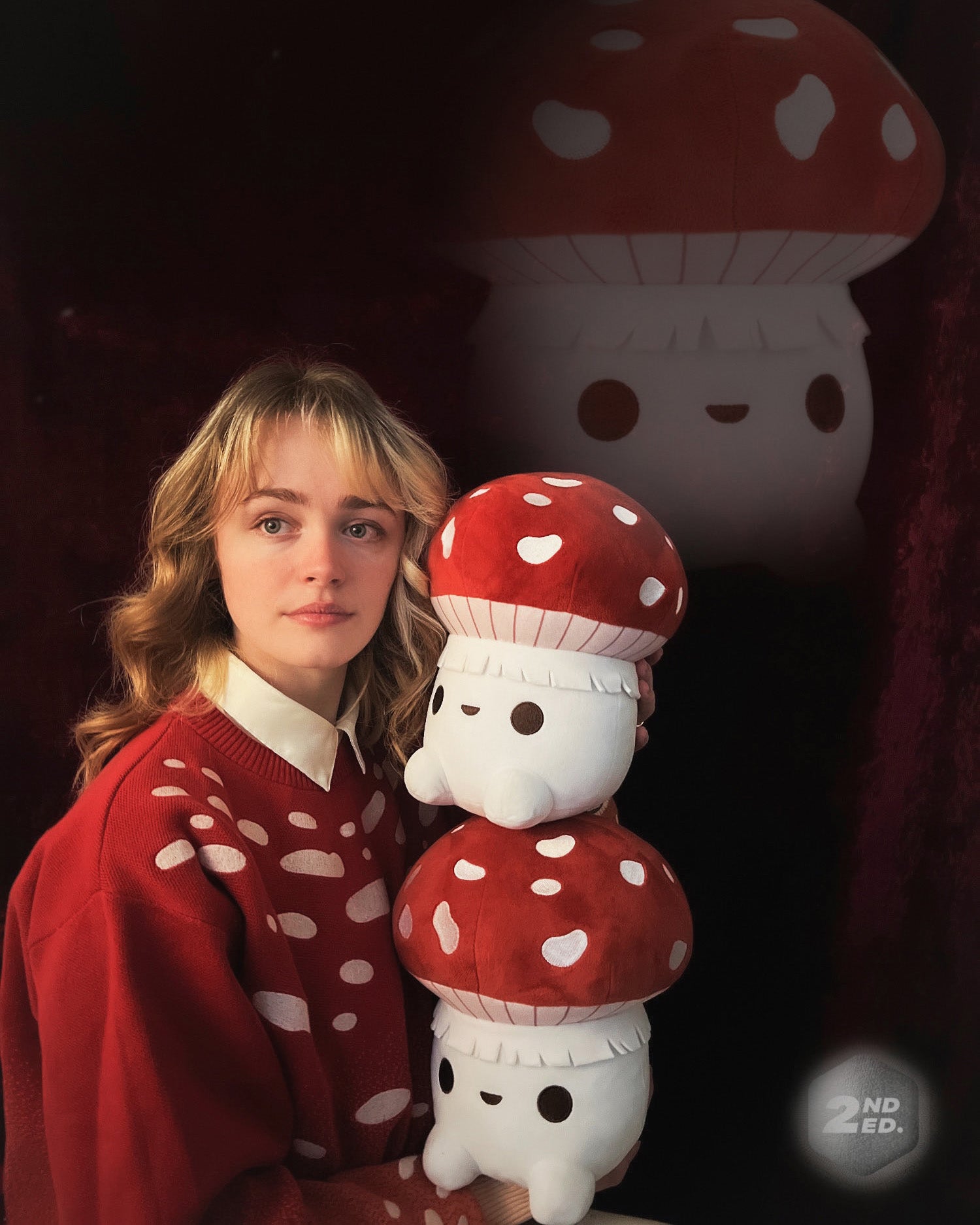 abi toads holding her fly agaric mushling plushies