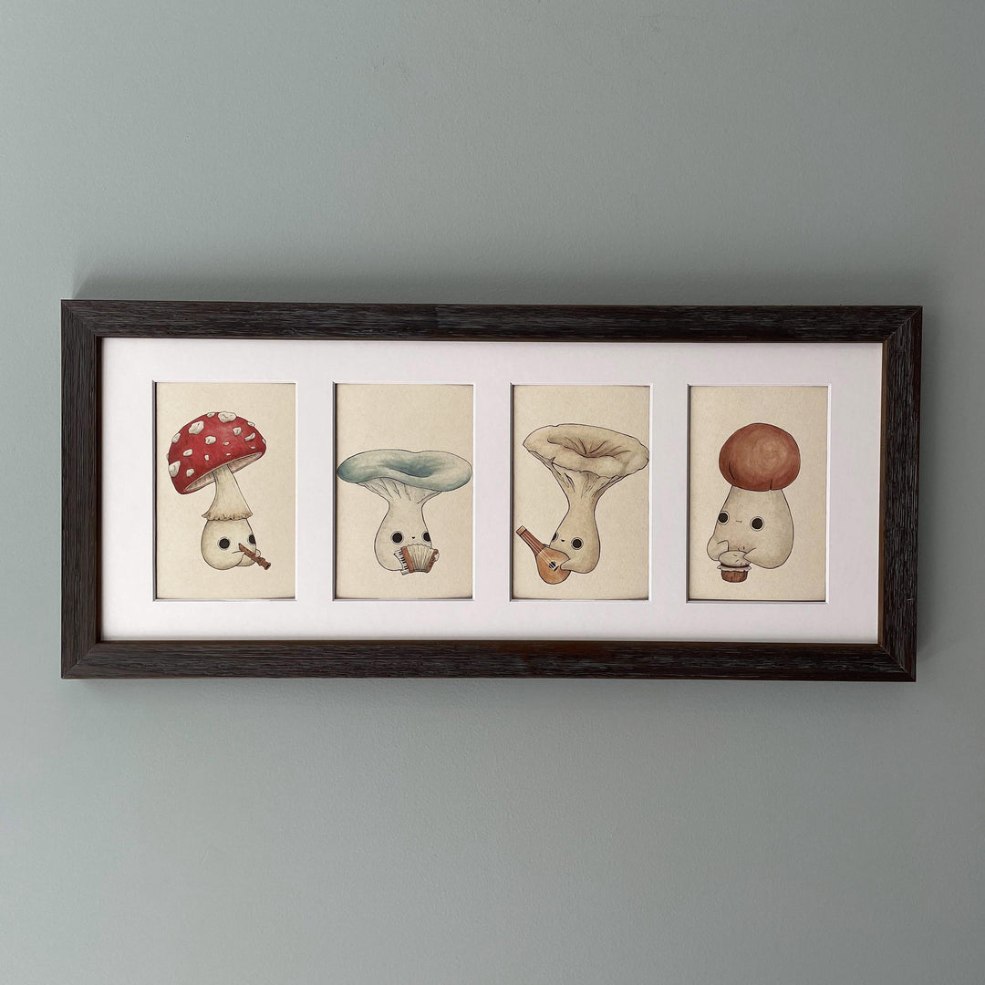 four individual prints of four mushlings playing various instruments in a frame