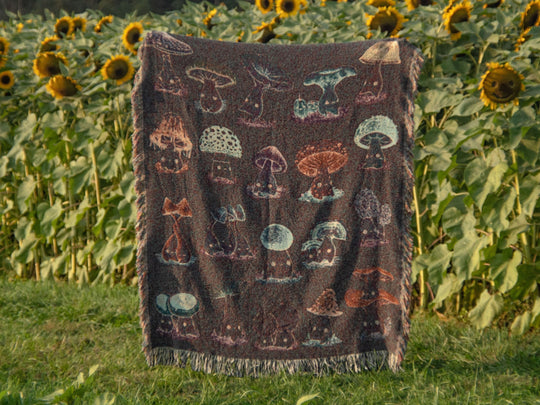 woven throw blanket depicting mushroom characters reverse side with inverted colors