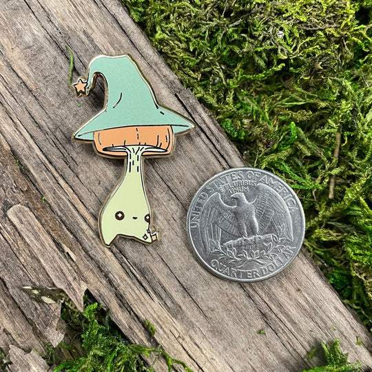 wizard mushling pin next to quarter for reference