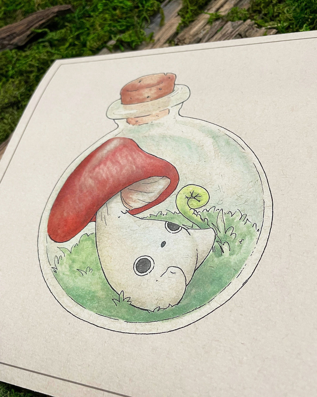 print depicting red cap mushling in a round jar closeup