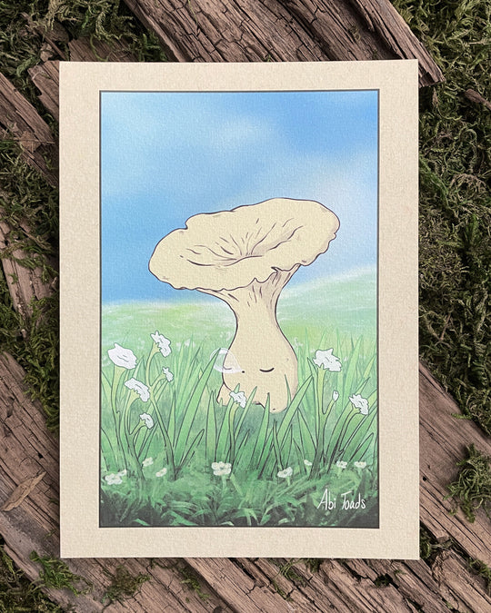 print of chanterelle mushling sleeping in a grassy field