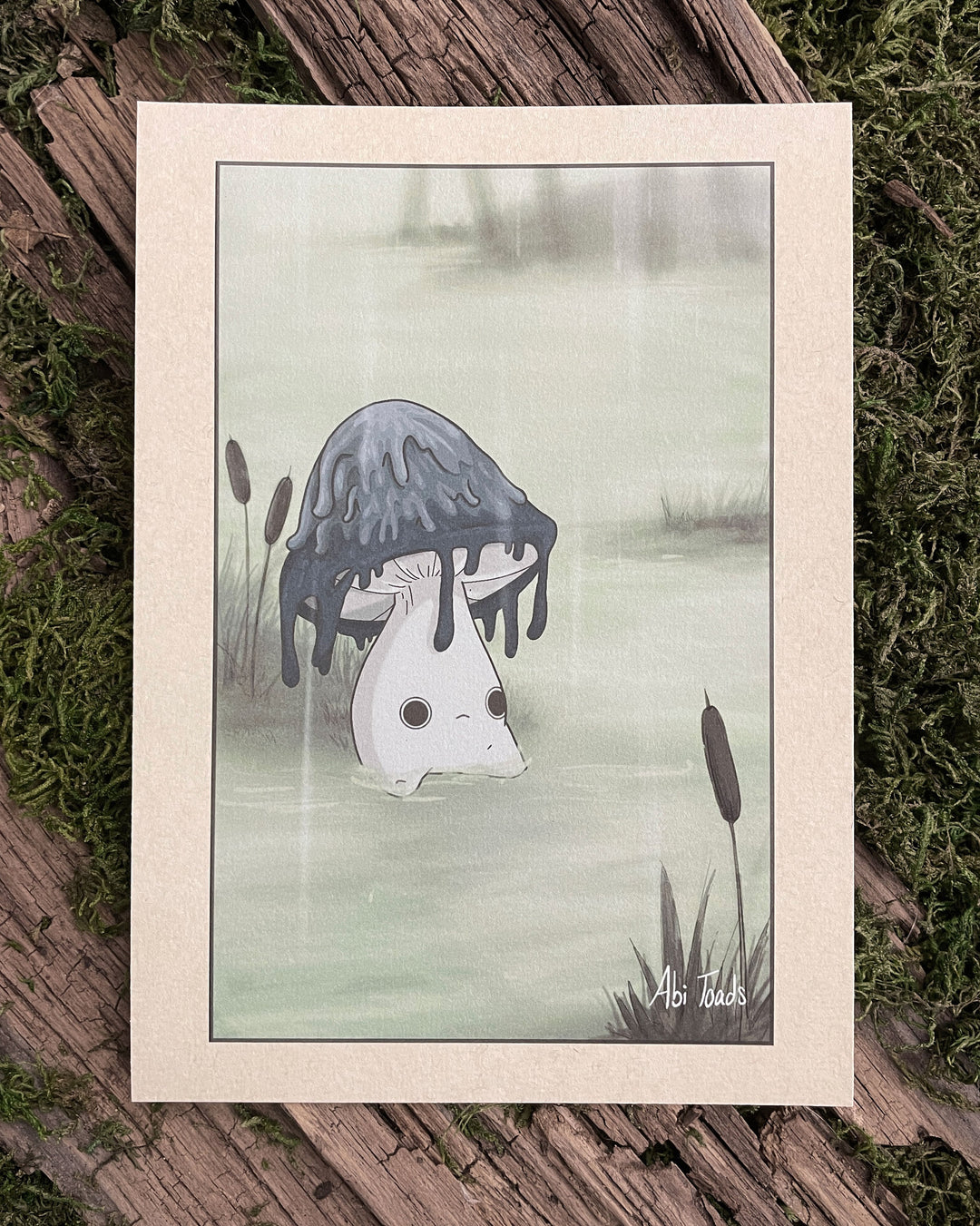 print of inky cap mushling sitting in a grey rainy swamp