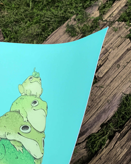 print depicting four frogs stacked on top of each other closeup