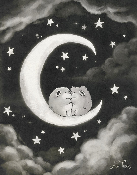 Two frogs sitting on a crescent moon surrounded by stars and clouds in black and white