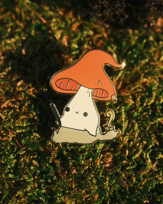 witch hat mushling pin on a mossy background